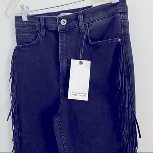 Washed black Zara skinny jeans with fringe!